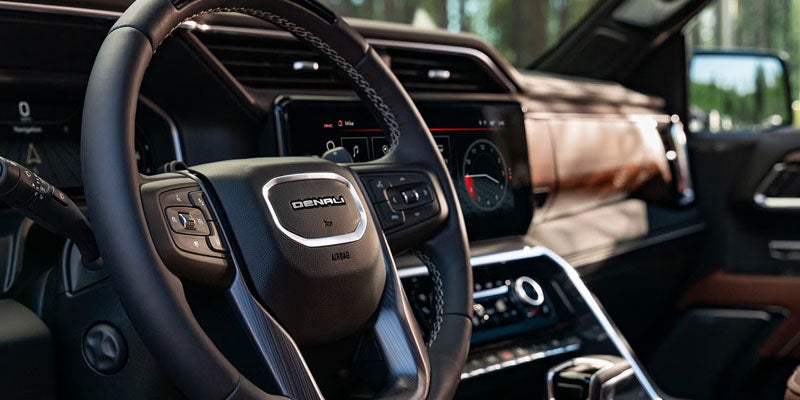 2026 GMC Steering wheel and dashboard