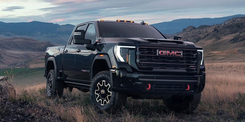 2026 GMC Sierra 2500 HD parked on rugged terrain