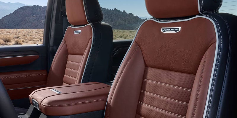 Premium leather front seats inside the 2026 GMC Sierra 2500 HD