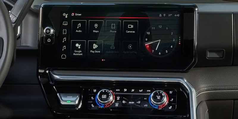 2026 GMC Sierra 2500 HD infotainment touchscreen and dashboard controls
