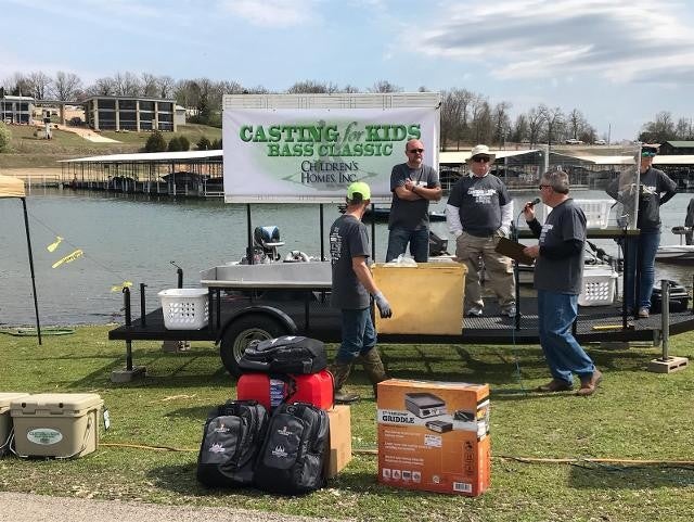 casting kids banner and people stading