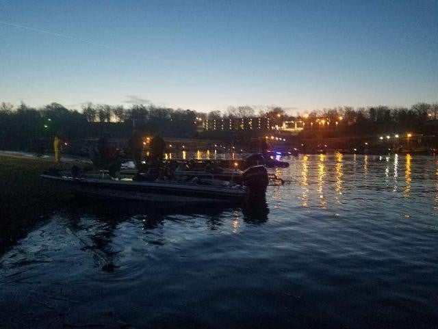 river with lights reflecting on the water