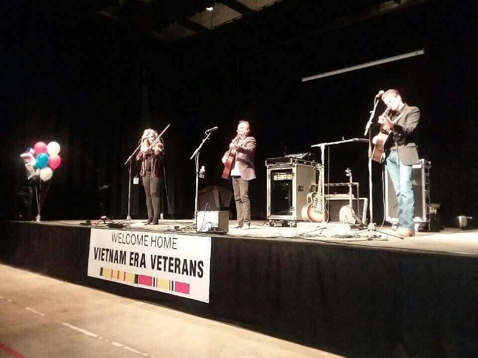 A live band performs on stage for vietnam